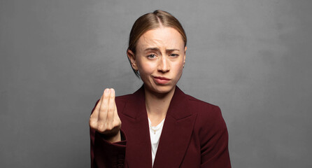 making capice or money gesture, telling you to pay your debts!