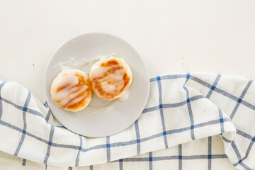 Cottage cheese fritters served on  white table