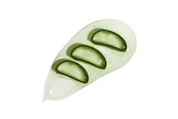 Aloe vera gel smear texture and pieces of aloe plant isolated on white background. Skin care cosmetics sample.