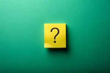 Night Photography of a Question Mark on a Yellow Sticky Note with a Green Pastel Background, Symbolizing the Search for Answers in a Poll and Audience Engagement Context