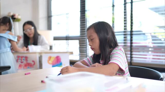 Portrait of special students doing learning activities in a special classroom