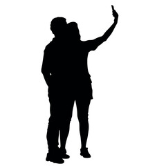 A couple standing side by side, with one person holding the phone for a selfie. The two are close together silhouette
