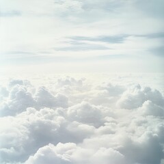 White fluffy clouds in a blue sky.
