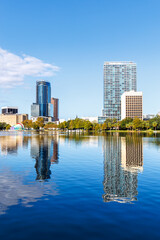 Fototapeta premium Orlando skyline at Lake Eola Park downtown in fall season portrait format in Florida in the United States