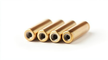 Close-up of the positive ends of three alkaline batteries, isolated on a white background.