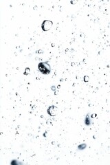 Close-up of water droplets in suspension.