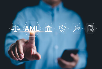 AML, Anti Money Laundering and Financial Compliance Concept. Businessman touches on AML, icons for banking, security, monitoring, compliance, measures to prevent financial crime, regulatory adherence,