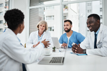 Doctor, team and happy with meeting in boardroom for healthcare diagnosis, surgery planning and...