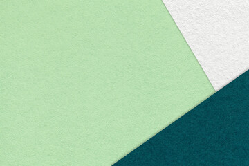 Texture craft light green paper background with white and emerald border. Vintage abstract olive cardboard.