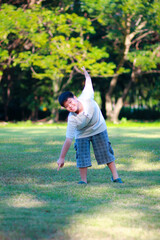 a boy walking on the grass