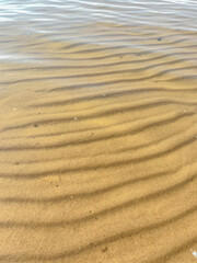  sand and wave on the beach. sand and wave on the beach