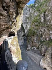Dramatic Canyon Road Overlooking River in Mountain Landscape