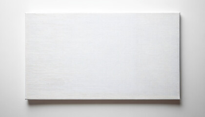 Empty white canvas with a subtle textured surface on a white background, ideal for art, creativity, or minimalist design concepts.

