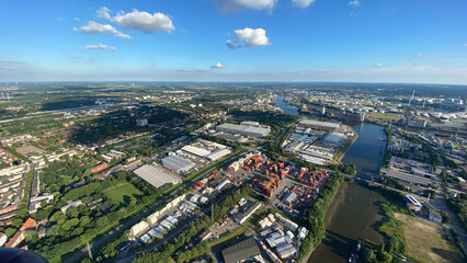Aerial View of Industrial Cityscape and River on a Clear Day