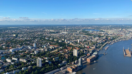 Aerial View of Urban Cityscape With River and Skyscrapers