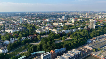 Aerial View of Urban Landscape with Lush Greenery and Buildings