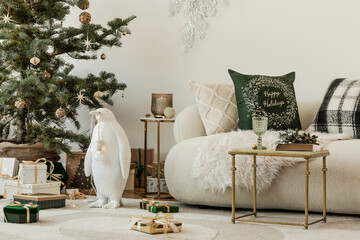 Fototapeta premium Charming Christmas corner with a tree, wrapped presents, and a cozy sofa. Inviting holiday home decor in soft tones.