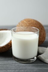 Glass of milk with coconuts on the table