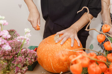 Creating a floral composition in a pumpkin. Making decor with your own hands.