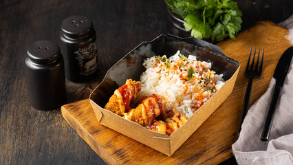 Take away meal rice with shrimps. Food delivery in disposable containers, balanced nutrition. Fresh cooked portions in lunch boxes, vegetarian dishes. Healthy eating, diet. Catering service concept.