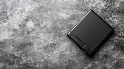 Minimalistic Black Wallet on Grey Textured Surface Perfect for Lifestyle Branding, Fashion Accessories, and Product Photography in Modern Settings