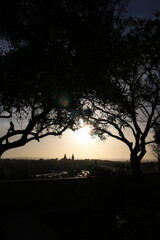 Distant view of a city in the sunset