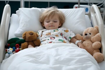 Boy in hospital bed, toys provide comfort to its young occupant, equipped with safety rails and easily accessible controls.