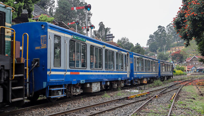 A Diesel Toy train arrives from Ooty town to Coonoor, a popular tourist attraction and travel destination in Tamil Nadu, India.