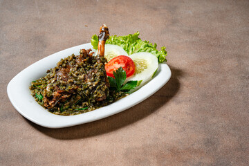 Bebek goreng cabe ijo or fried duck with green chili sauce.