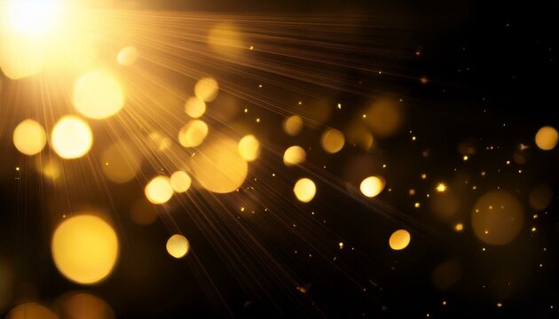 abstract background with lens flare and defocused bokeh flash gleam and golden yellow color flecks on dark black