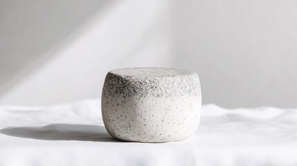 Monochromatic Ceramic Masterpiece: A Study in Texture and Light