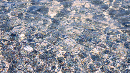 Waves On The Beach. Clear Water Of The Sea Surf And Pebble Beach.