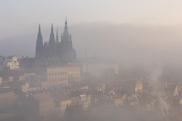 Prague castle in fog.