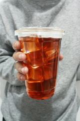 Coffee cup in hand front view
