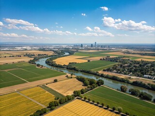 Scenic Aerial View of Modesto, California Showcasing Lush Farmlands, Urban Landscapes, and the Beautiful Tuolumne River under a Clear Blue Sky