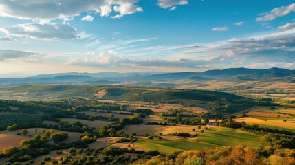 Beautiful aerial landscape on green background. Natural background. Aerial view of green fields. Pasture landscape. Dramatic aerial view of idyllic rolling patchwork farmland with beautiful wooded bor