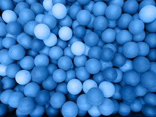 Blue color many plastic balls background