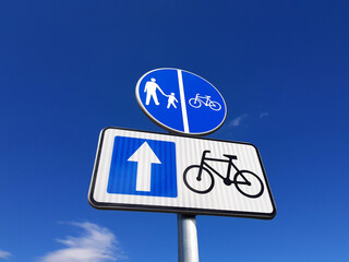 Vertical road sign for bicycles.