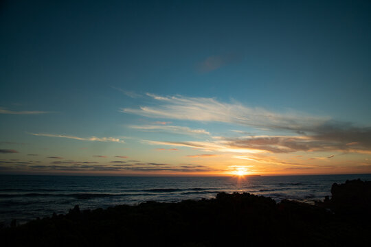 Sun setting behind Lady Julia Percy Island across the water from The Crags on The Great Ocean Road