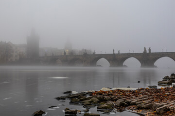 Charles bridge in foggy morning. ( Karluv most v ranni mlze) Prague