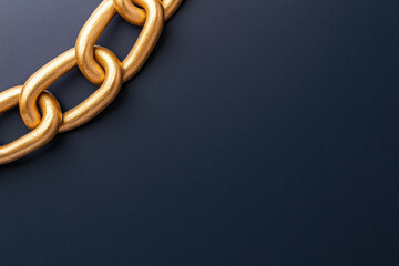 A close-up view of a golden chain link on a dark background, showcasing its smooth texture and shine, perfect for design and aesthetic needs.