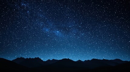 Stunning night sky filled with countless stars above majestic mountains, creating a serene and breathtaking celestial landscape.
