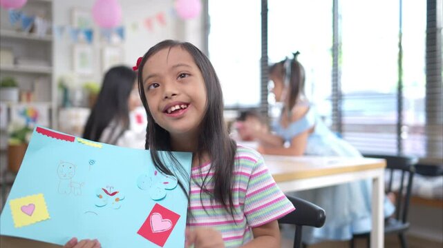 Portrait of special students doing learning activities in a special classroom