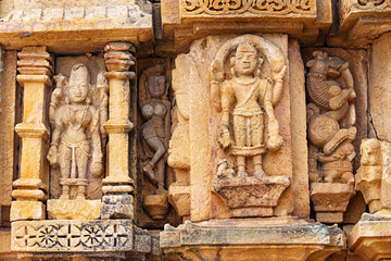 Carved sculptures of Hindu deities on the Vishwanatha Shiv Temple, located in Karimati, Umaria, Madhya Pradesh