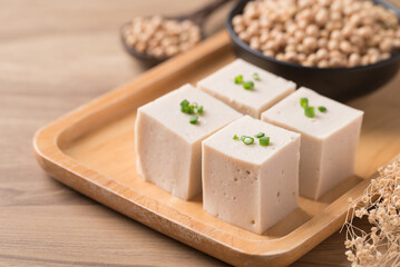 Fresh tofu with soy bean seeds, Vegan food ingredient in Asian cuisine, Plant based diet