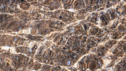 Waves On The Beach. Clear Water Of The Sea Surf And Pebble Beach.