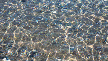 Waves On The Beach. Clear Water Of The Sea Surf And Pebble Beach.