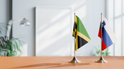 FLAGS OF JAMAICA AND SLOVENIA ON TABLE