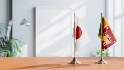 Obraz premium FLAGS OF JAPAN AND SRI LANKA ON TABLE