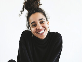  A portrait of a young, happy woman looking directly at the camera, set against a white background, perfect for portrait photography, lifestyle, or personal branding projects
